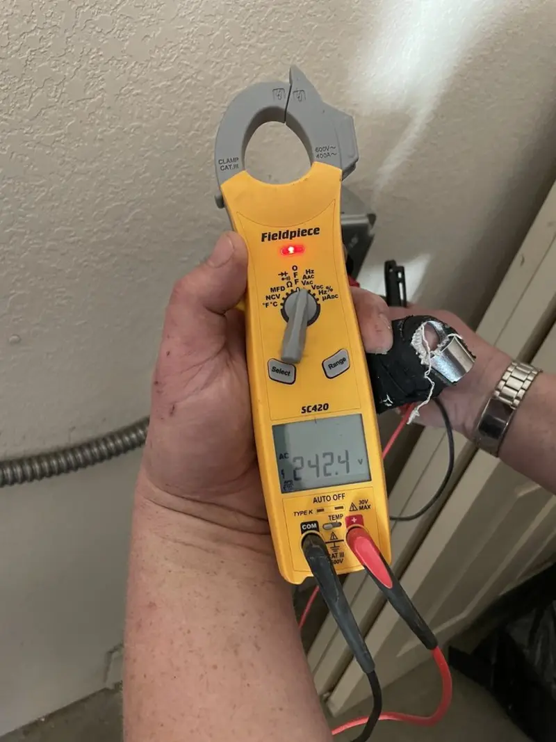 Voltage testing with clamp meter during Generator Installation in Burnet